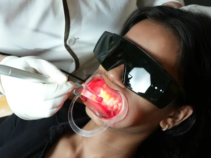 Patient undergoing a laser dentistry treatment